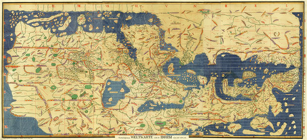alt: Mapa světa od arabského učence Idrisiho z roku 1154. Faksimile rukopisu, které publikoval K. Miller roku 1928. Na této mapě je sever dole. Zdroj: Mapová sbírka Přírodovědecké fakulty UK.